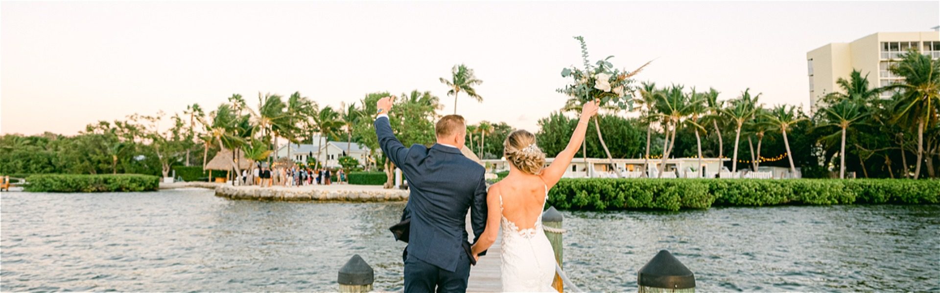 Happy vouple facing east looing towards the best wedding venue in key largo