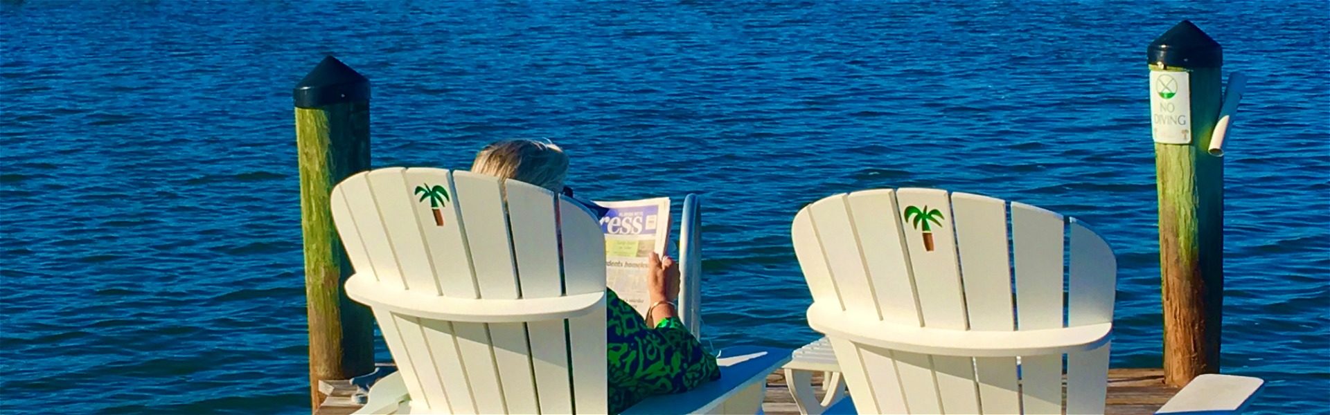guests enjoying morning coffee on the dock over the Florida Bay