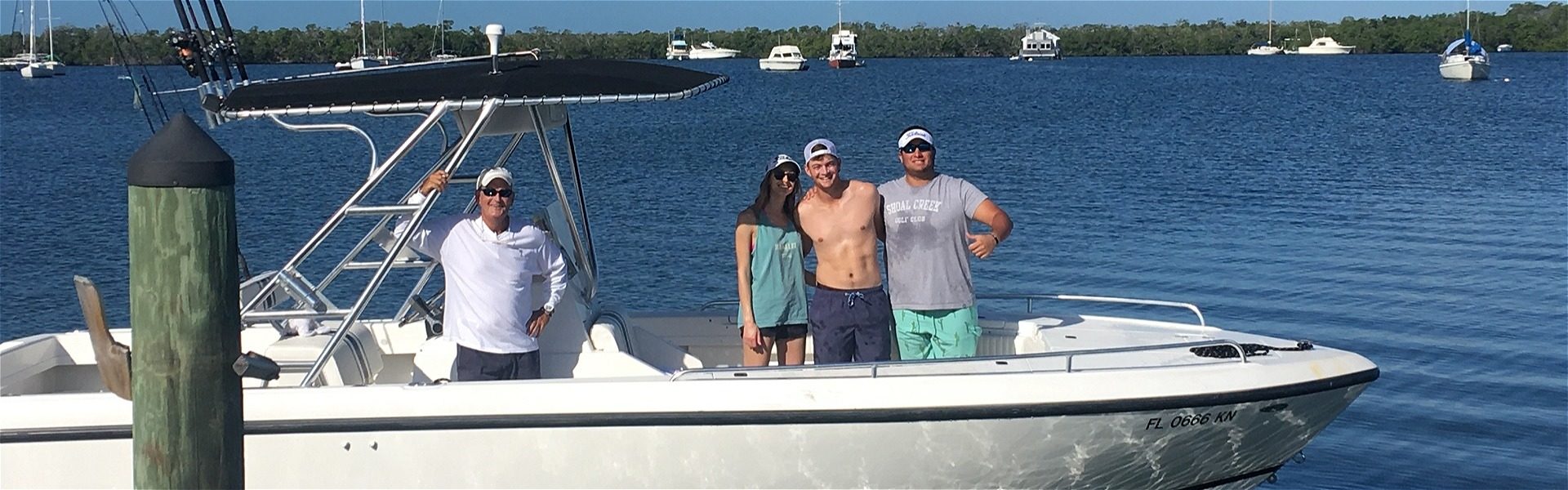 Happy guests on their boat