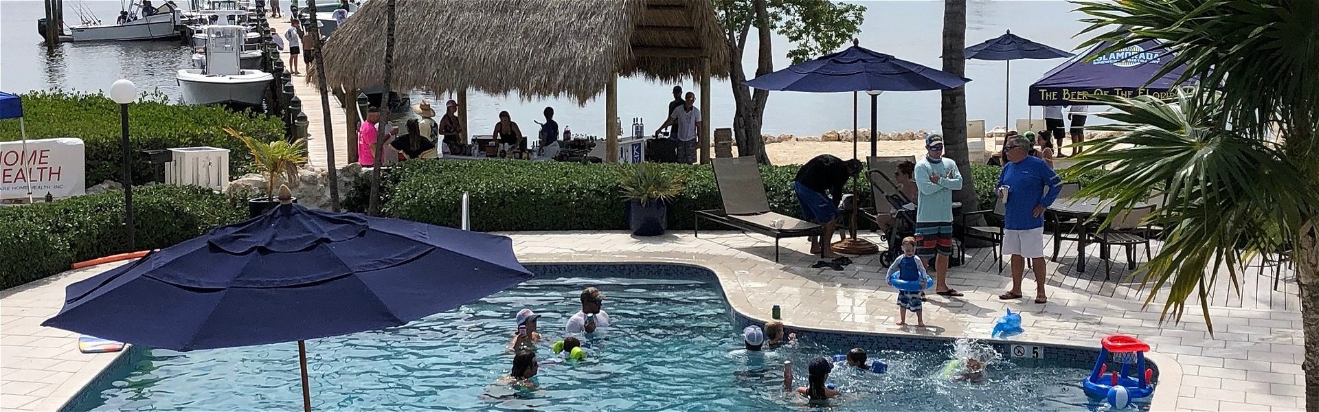 Family reunion in the heated bayfront pool at Coconut Palm Inn
